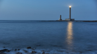 Lighthouse moonlit ocean shore tiltshift - the ocean shore free wallpaper