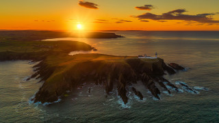 Sunset lighthouse island water sky - anna findlay free wallpaper