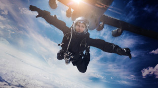 Parachuting man black suit plane - a black suit free wallpaper
