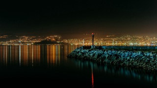 Lighthouse pier city night reflection - almada negreiro free wallpaper