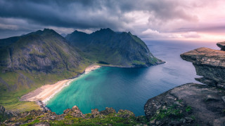 Beach mountains cliff ocean cloudy - free landscape wallpaper