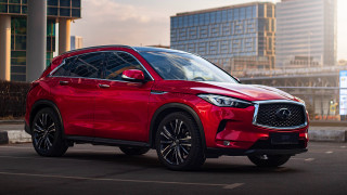 Red infiniti parking lot tokyo - a parking lot in front free wallpaper