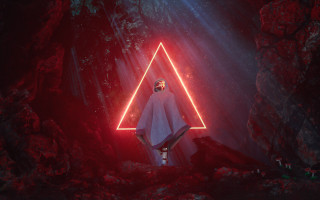 Man cave neon triangle red - the side of his face free wallpaper