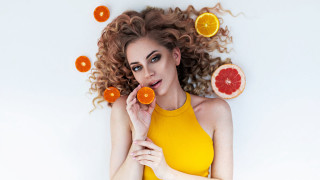 Woman curly hair oranges wind - curly free wallpaper