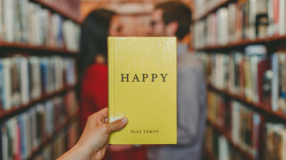 Library holding book blurry background - dave allsop free wallpaper for desktop