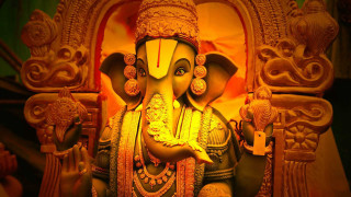Elephant statue man head temple - a yellow light free wallpaper