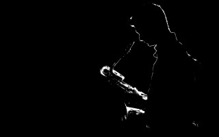 Saxophone man black background white - a man playing free wallpaper