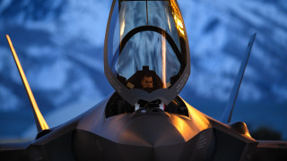 Fighterjet cockpit night mountains blonde - face free wallpaper