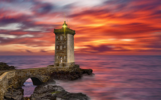 Lighthouse rock wall sunset clouds - thierry doizon free wallpaper for desktop