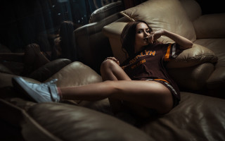 Woman sitting couch basketball shoe - free vintage wallpaper