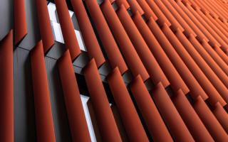 Wall pattern orange white 3D - a close up of a wall free wallpaper