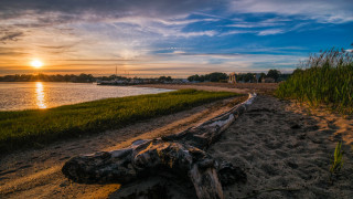 Log sand water sunset bridge - a log free wallpaper