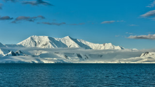 Mountain range snow clouds lake - a body of water below free wallpaper