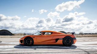 Orange sports car runway blue - a runway free wallpaper