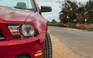 Red mustang forest road sign - the side of a road next free wallpaper