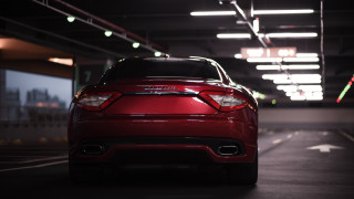 Red car parking garage night 3 - the back of the car free wallpaper