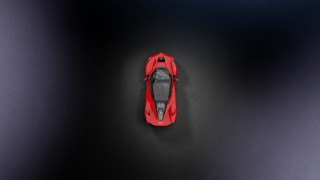 Red car above black shadow - a red car free wallpaper for desktop
