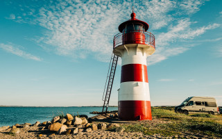 Lighthouse rocky shore van military - a rocky shore free wallpaper