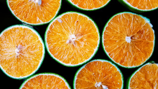 Oranges halved table top black - christian w. staudinger free wallpaper