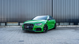 Green car building metal wall - a green car free wallpaper