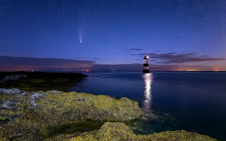 Lighthouse rocky shore night space - free airplane wallpaper for desktop