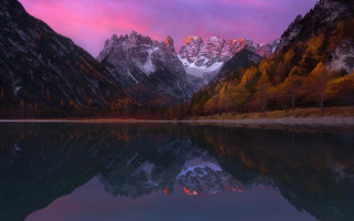 Mountain range reflection sunset mystical 2 - a pink sky in the foreground free wallpaper