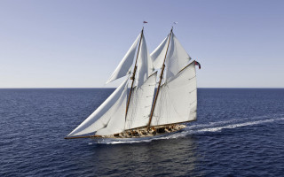 Sailboat open ocean sunny day - open free wallpaper