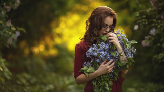 Woman flowers serious bokeh outdoors - a bunch of flowers free wallpaper
