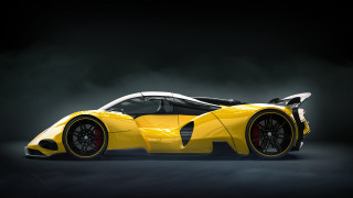 Yellow sports car black background - a yellow sports car free wallpaper
