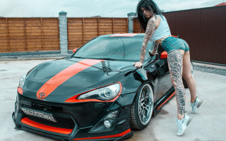 Woman sportscar parkinglot tattoo highheels - the hood of the car free wallpaper