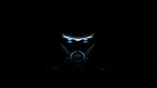 Creepy glowing eyes hooded male - a creepy look free wallpaper for desktop