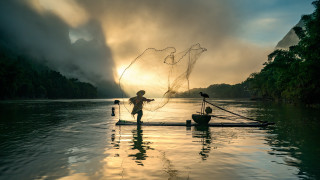 Fishing boat man water sunset - adrian zingg free wallpaper