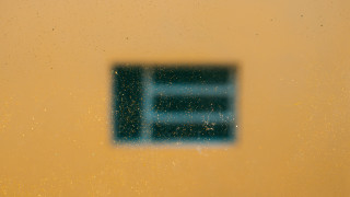 Blue window yellow wall night - a blue window free wallpaper