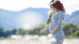 Woman blue dress flower bokeh - her stomach free wallpaper