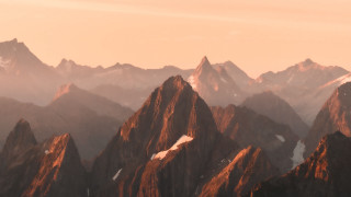 Mountains snow sunset hazy clouds - hazy free wallpaper