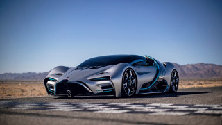 Silver sports car desert mountains 7 - a road in the desert free wallpaper