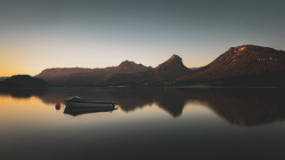 Boat mountains sunset water cape - the water in front free wallpaper