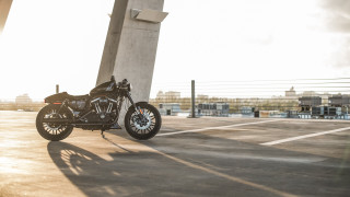 Motorcycle parking lot tall building - hard edge free wallpaper