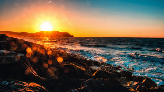 Sunset ocean rocks water mountain - rock and water free wallpaper