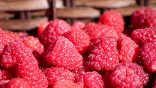 Raspberries strawberries macro photorealism food - a basket of strawberries free wallpaper
