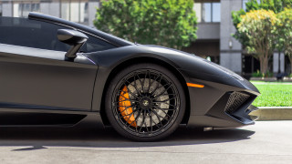 Grey sports car orange rims - tire free wallpaper for desktop