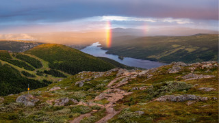 Rainbow mountain trail lake city - a lake in the distance free wallpaper