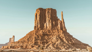Desert rock formation sky people - doug wildey free wallpaper