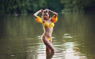 Woman yellow bikini lake eskter - her arm behind her head free wallpaper