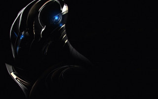 Futuristic robot glowing eyes night - a futuristic looking robot free wallpaper