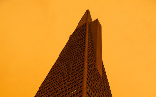 Tall building clock yellow sky - the top of its free wallpaper