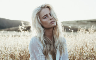 Blonde woman field mountain beach - a mountain in the background free wallpaper