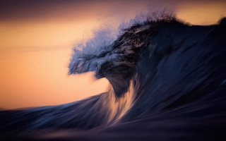 Large wave crashing shore sunset - a large wave free wallpaper
