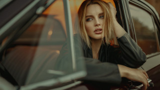 Woman sitting car serious blonde - artur tarnowski free wallpaper