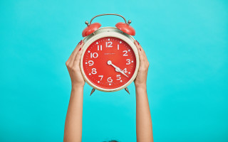 Person holding red clock blue - a person holding free wallpaper